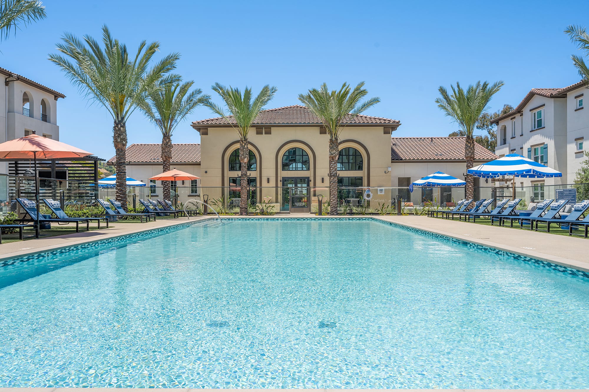 Resort-Style Saltwater Pool and Spa surrounded by Luxury Cabanas and Lounges