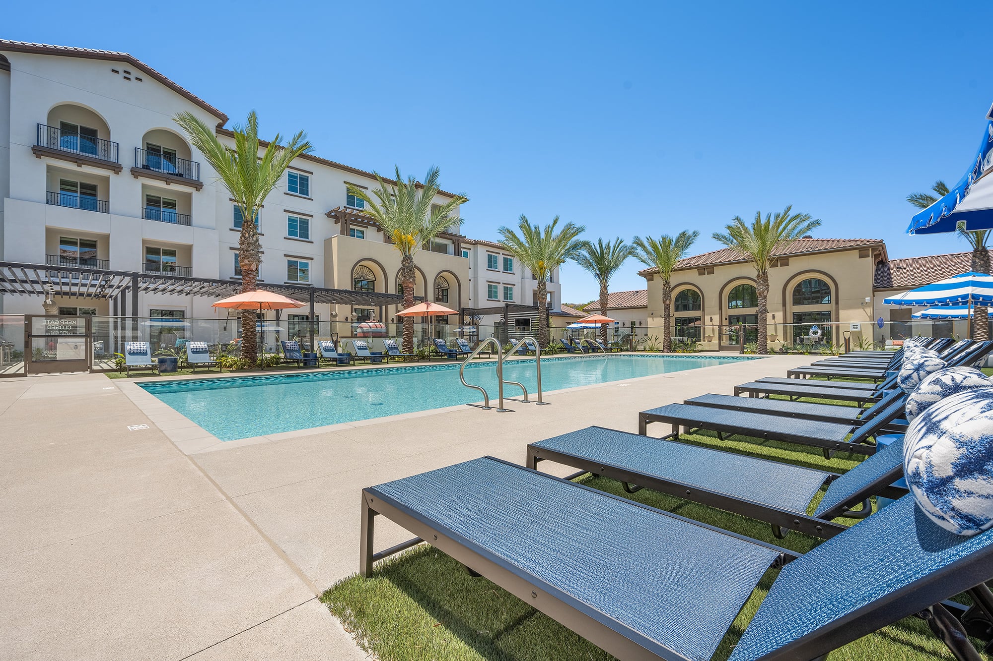 Resort-Style Saltwater Pool and Spa surrounded by Luxury Cabanas and Lounges