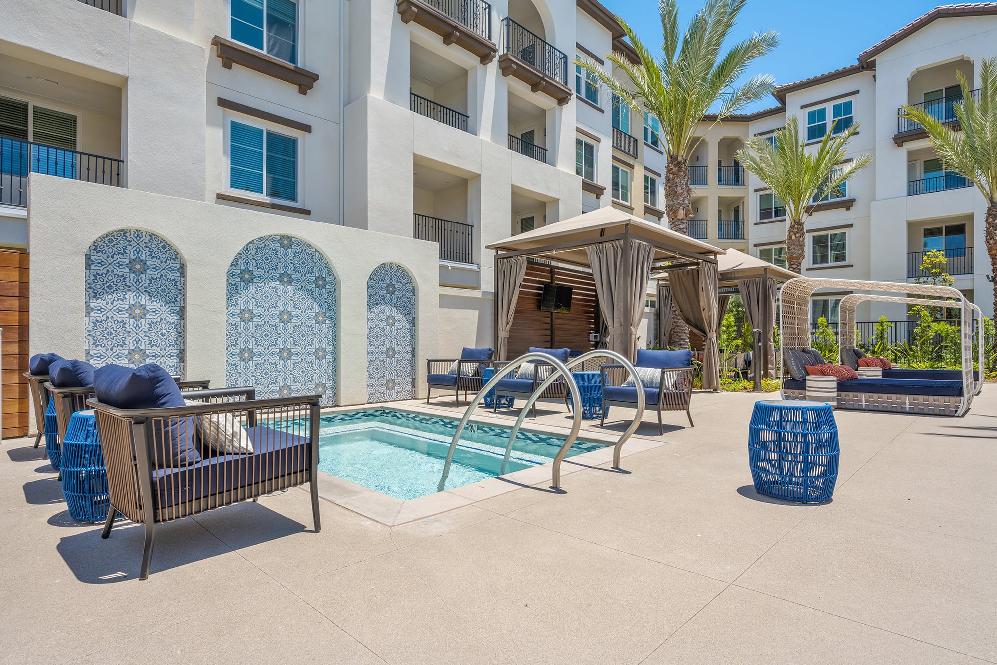 Resort-Style Saltwater Pool and Spa surrounded by Luxury Cabanas and Lounges